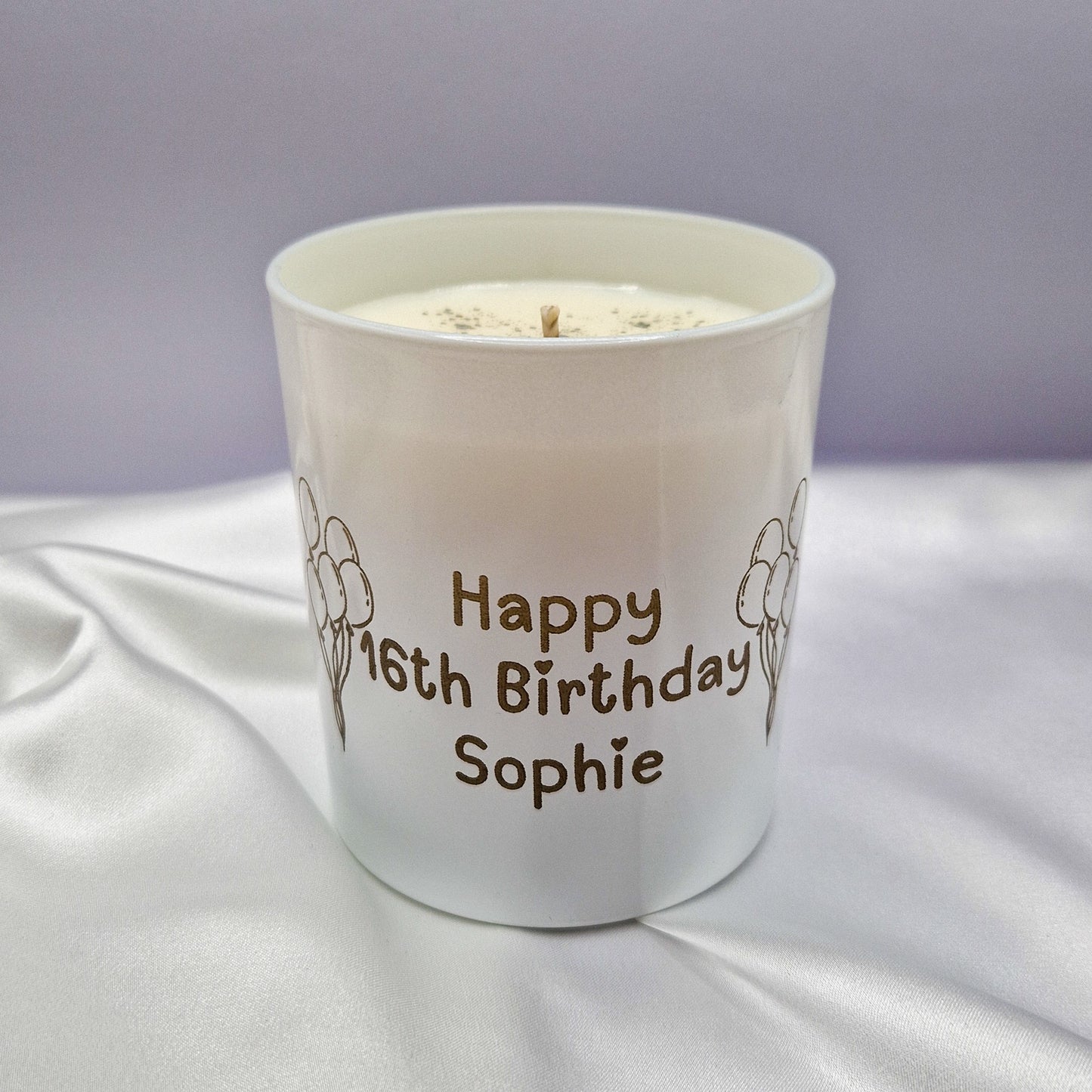Custom candle with the words Happy 16th Birthday Sophie