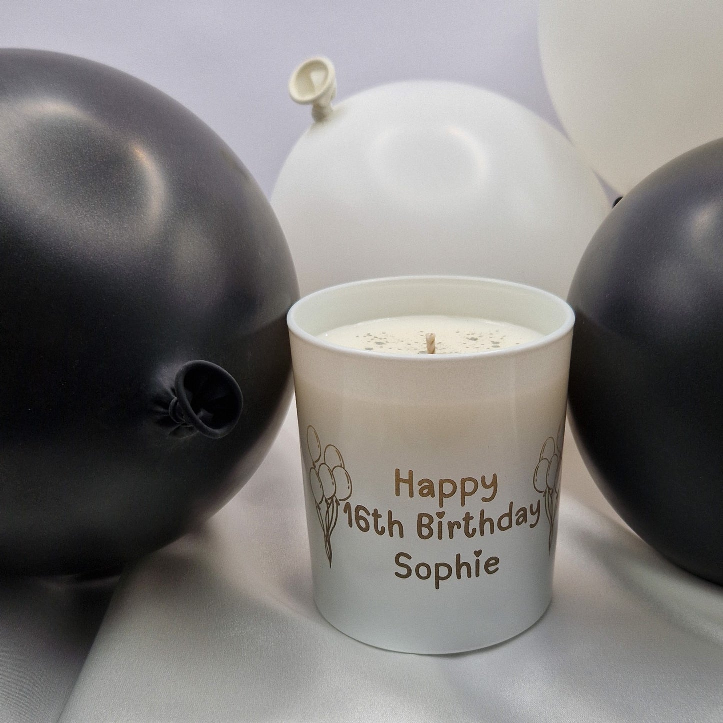 Custom candle with the words Happy 16th Birthday Sophie