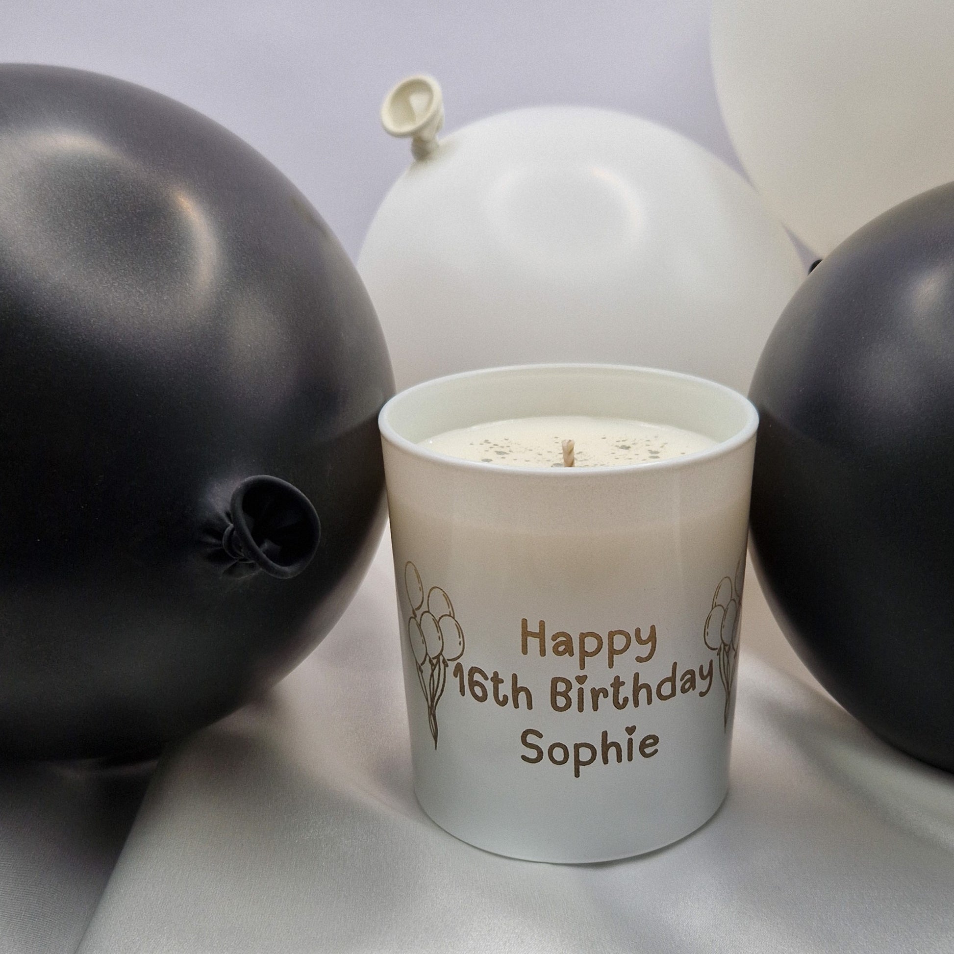 Custom candle with the words Happy 16th Birthday Sophie