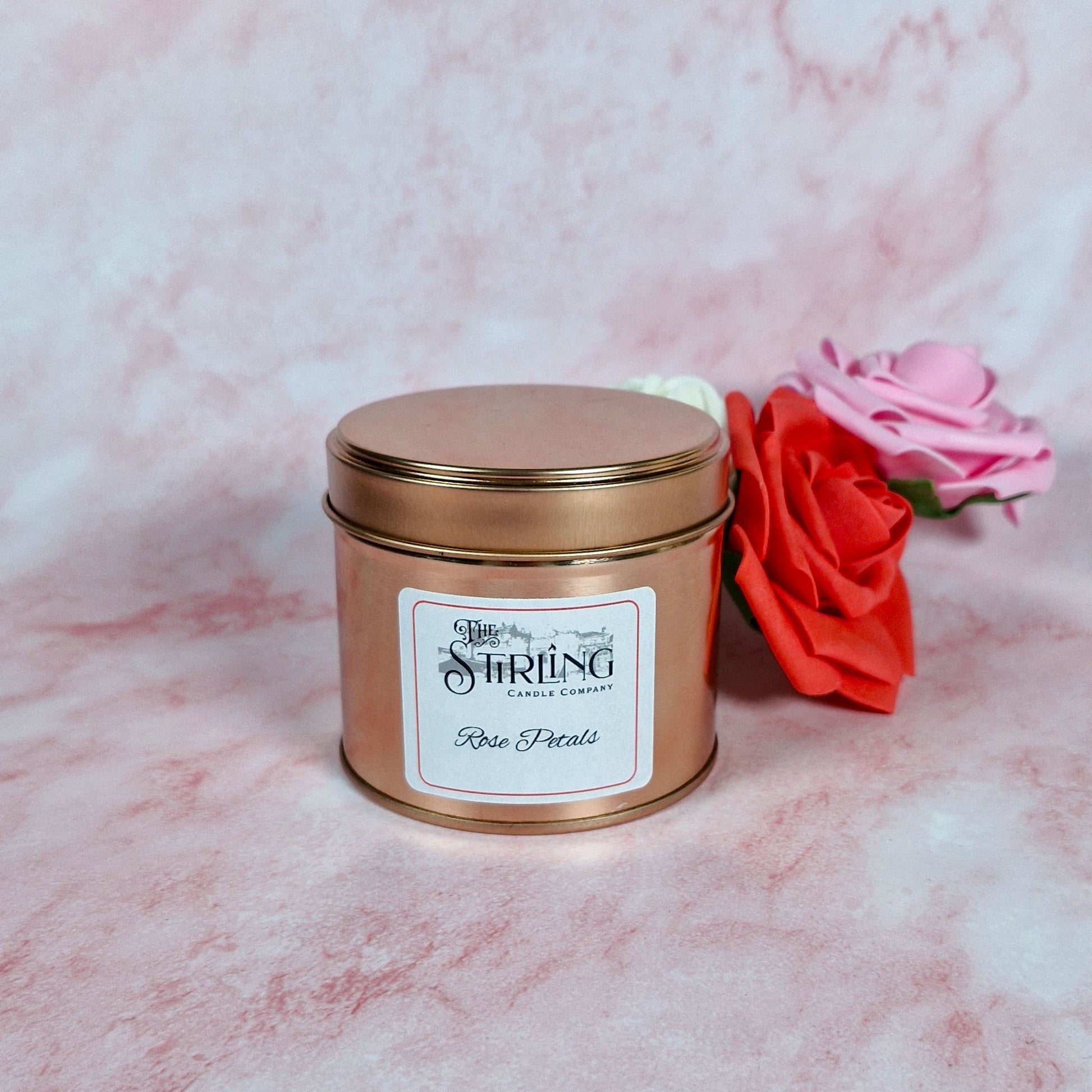 Rose Petal travel tin candle with lid on