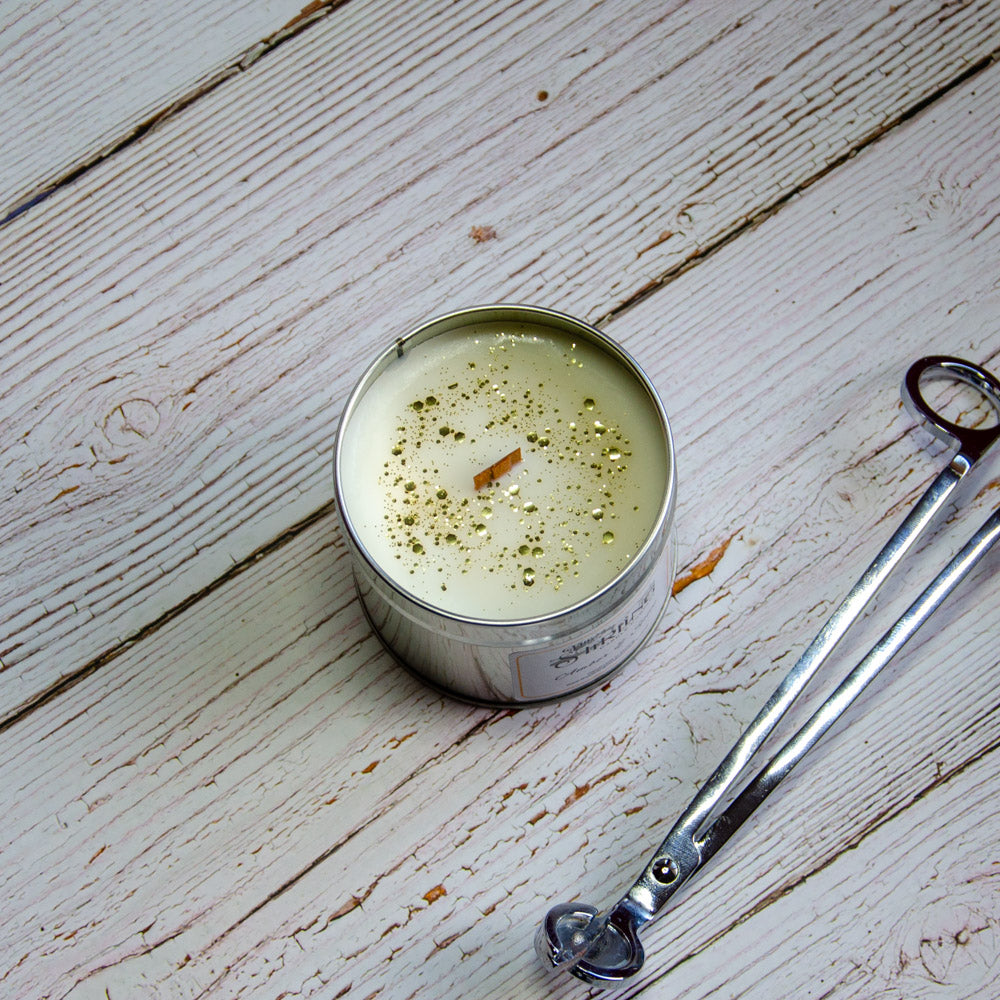 close up of Amber and Spice medium tin candle