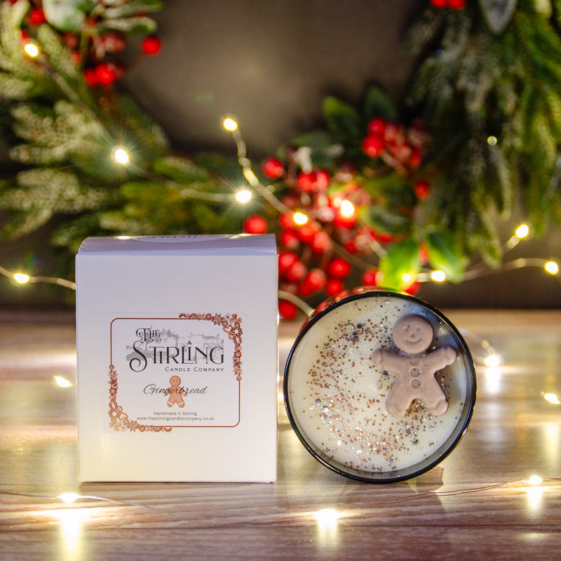 Black candle in the fragrance Gingerbread with matching box