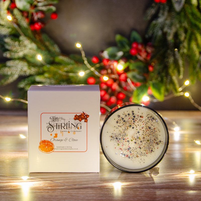 Black candle in the fragrance Orange and Clove with matching box