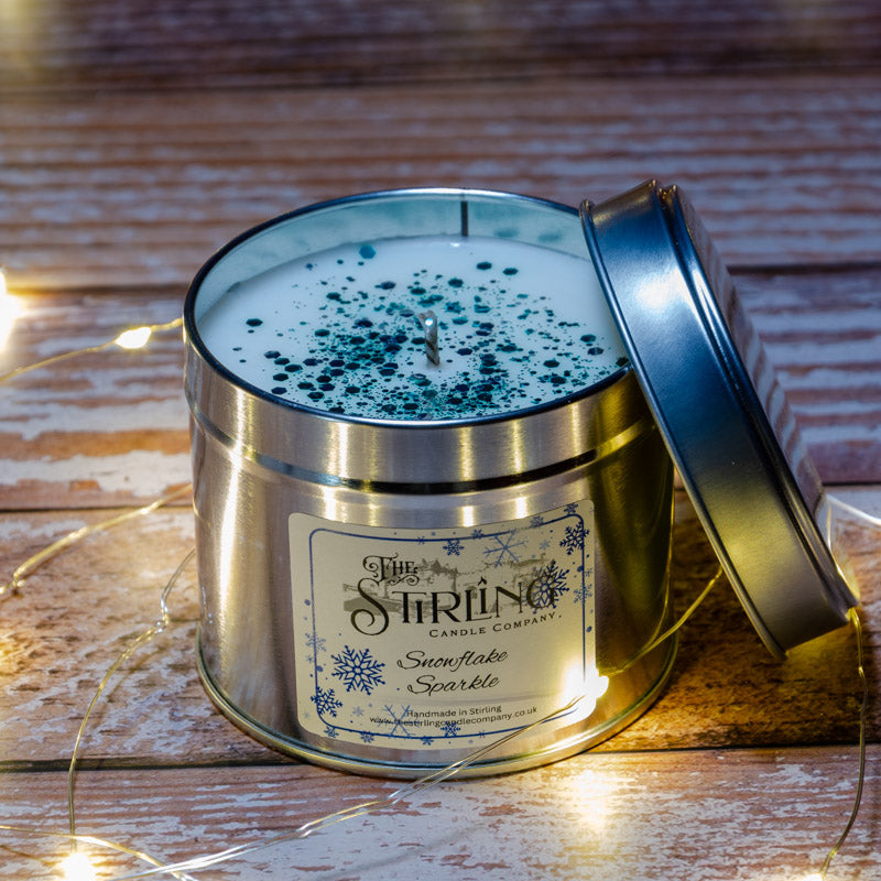 The Stirling Candle Company medium travel tin candle in the fragrance Snowflake Sparkle