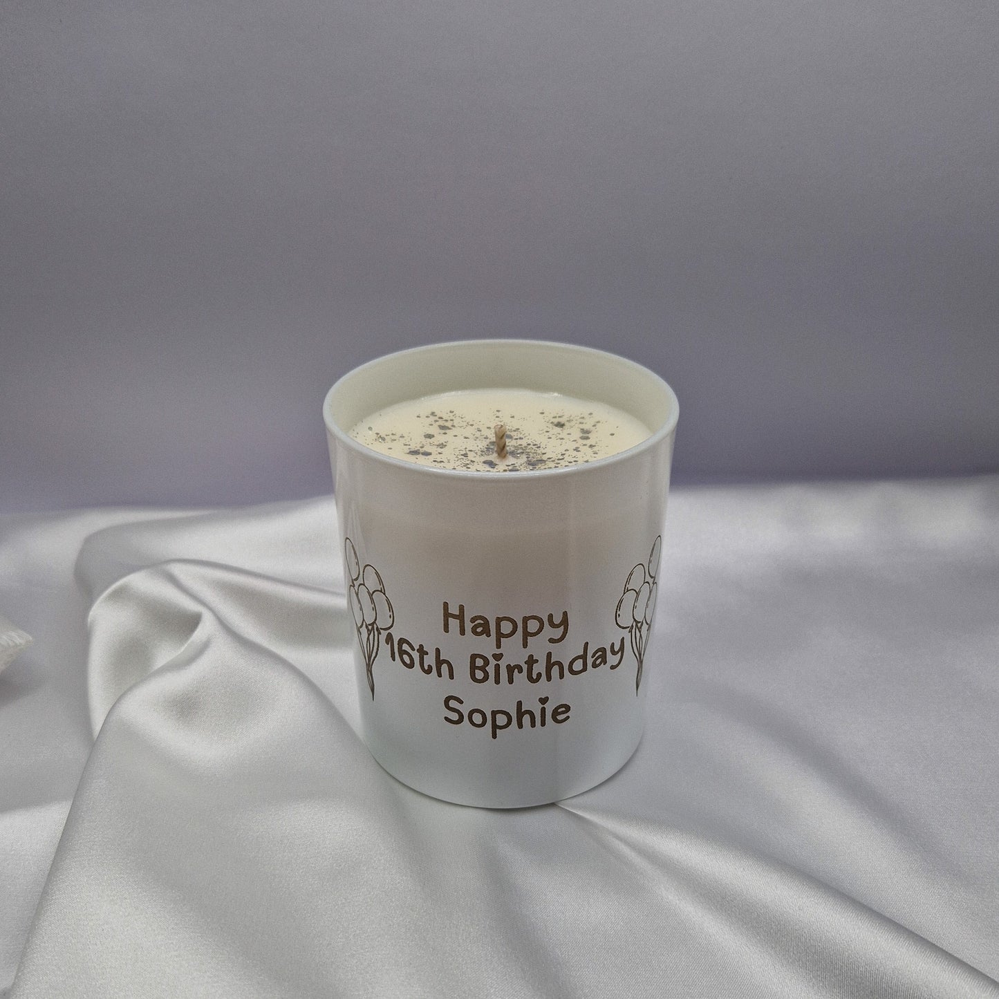 Custom candle with the words Happy 16th Birthday Sophie
