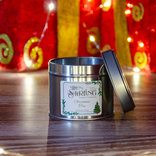 The Stirling Candle Company medium travel tin candle in the fragrance Christmas Tree