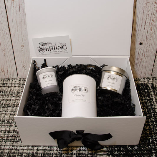 Candle gift box open with products displayed