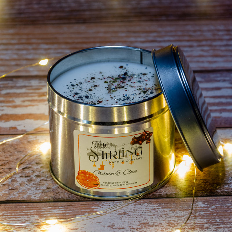 The Stirling Candle Company medium travel tin candle in the fragrance Orange & Clove