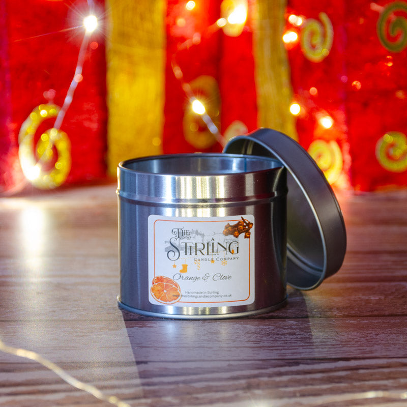 The Stirling Candle Company medium travel tin candle in the fragrance Orange & Clove